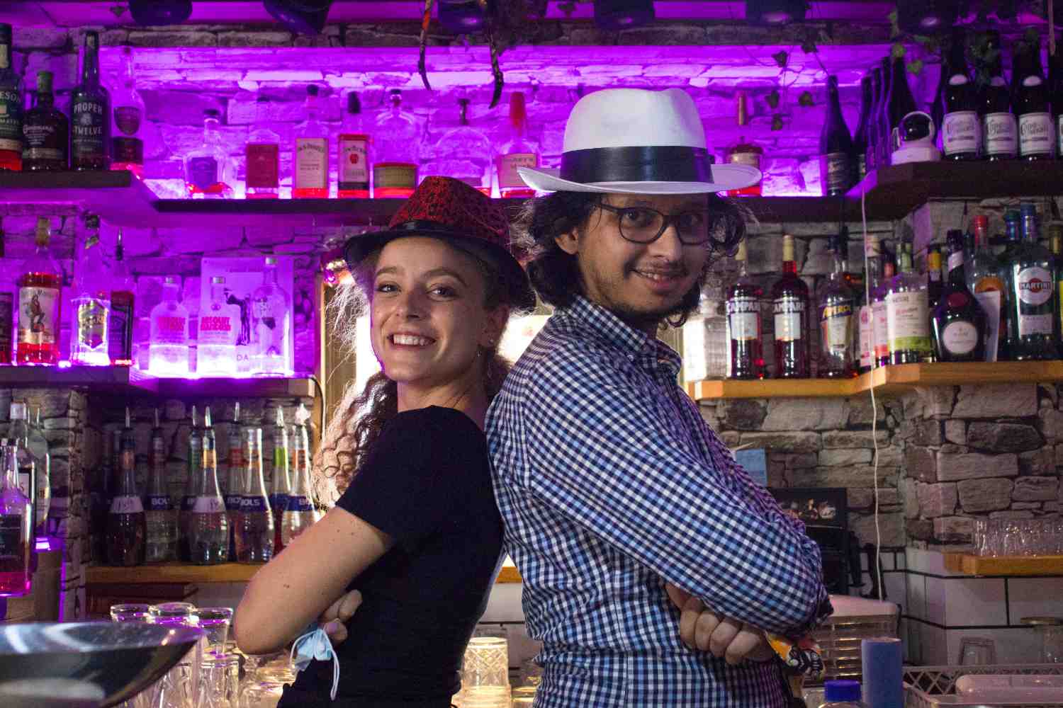 The Hatter Irish Pub interior with lively atmosphere and quirky Alice in Wonderland decor in Malta